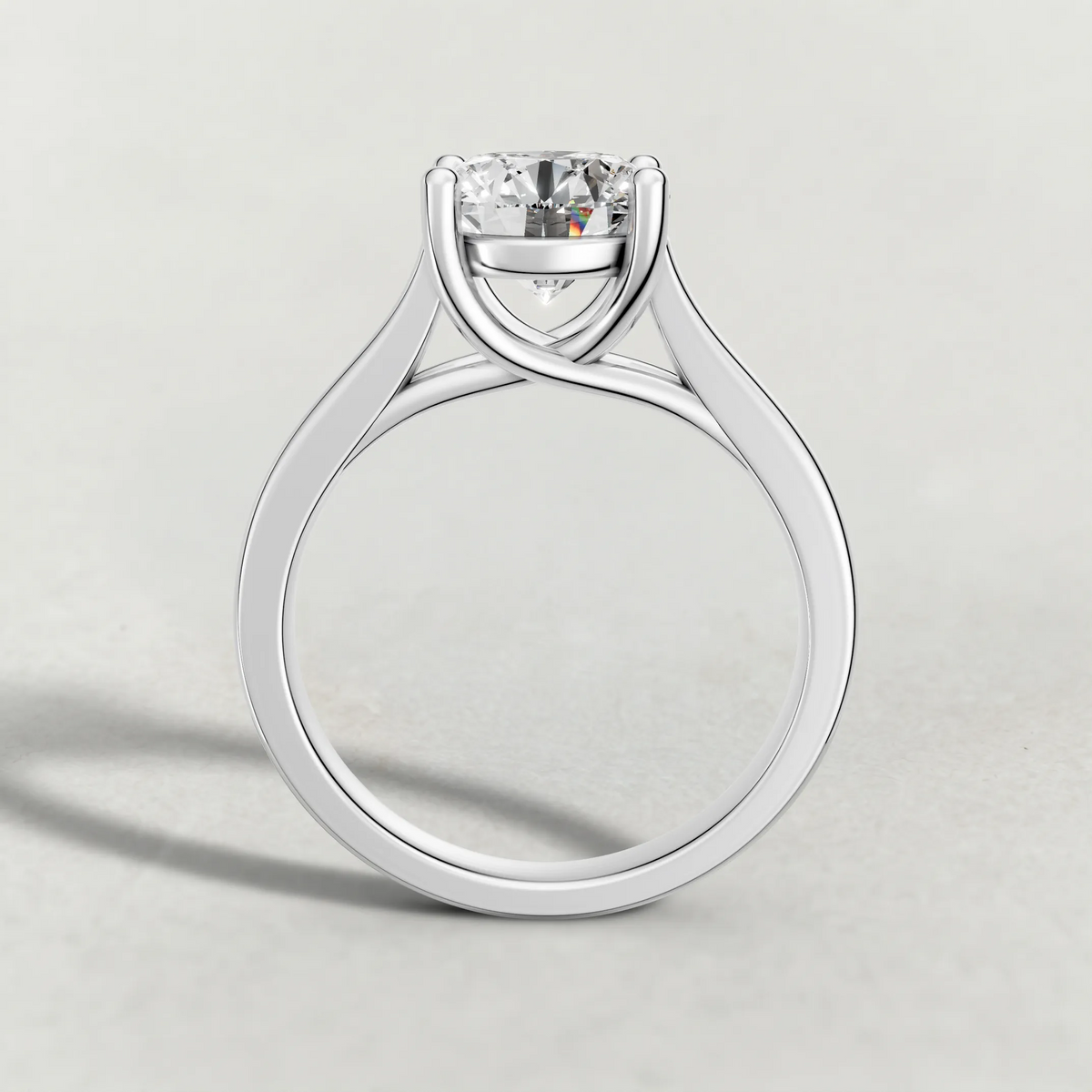 Swept Shoulder Solitaire Engagement Ring (0644) in Platinum from front angle