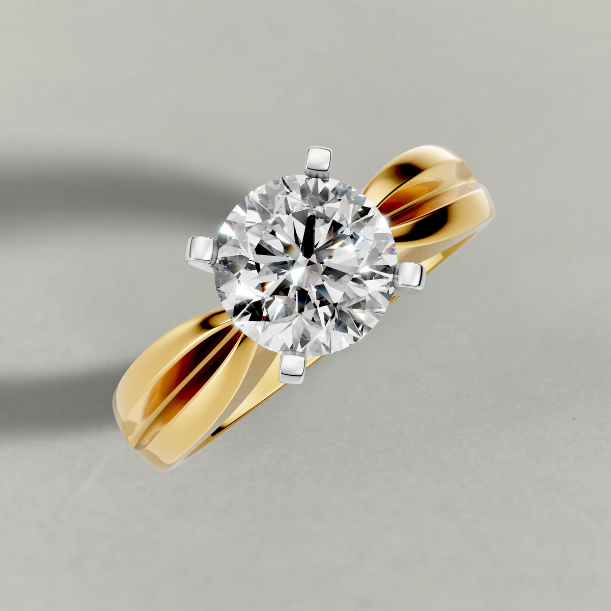 Sculpted Split-Shank Solitaire Engagement Ring (1596) in Yellow Gold from top 3/4 angle
