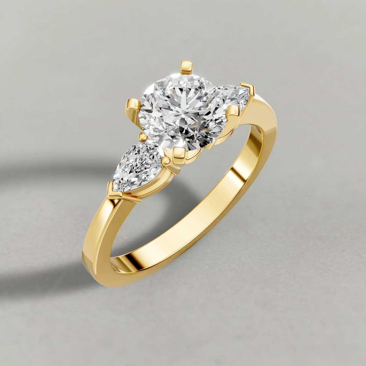 Three-Stone Side-Stone Engagement Ring (2046) in Yellow Gold from top 3/4 angle