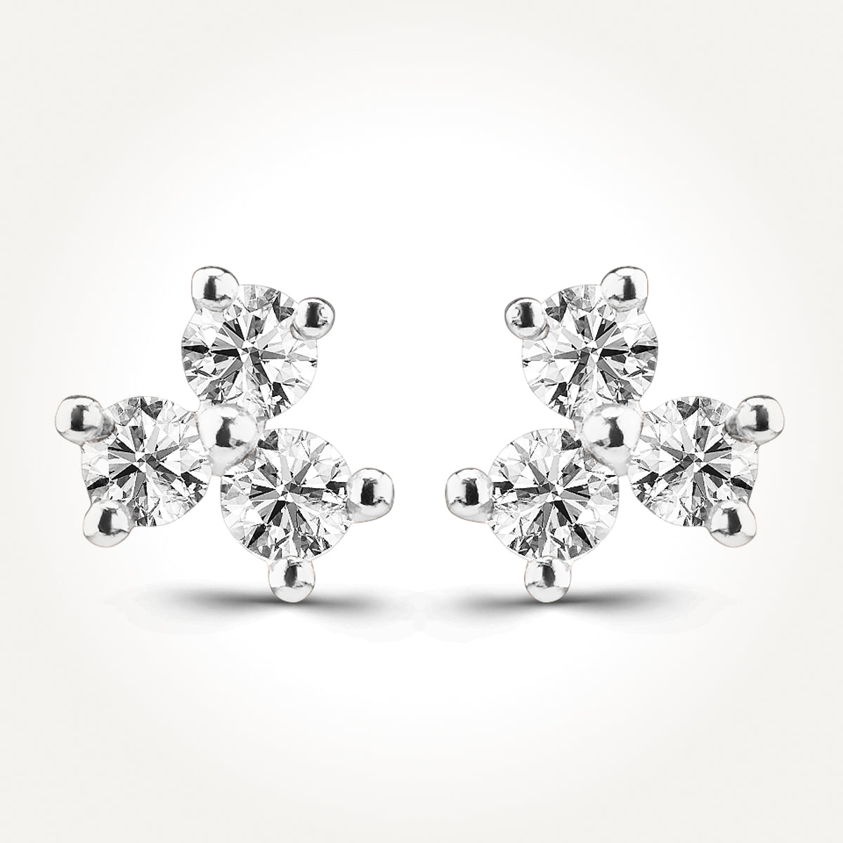 10KT White Gold Three Stone Stud Earrings 0.18 CT. T.W.