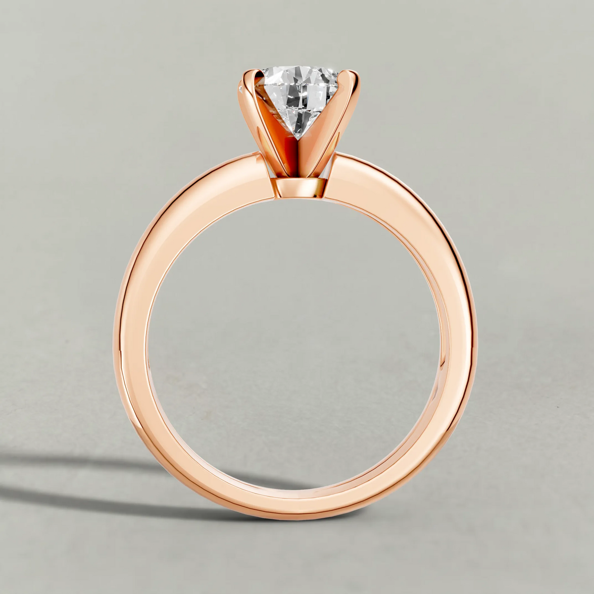 Wide Tapered Solitaire Engagement Ring (3808) in Rose Gold from front angle