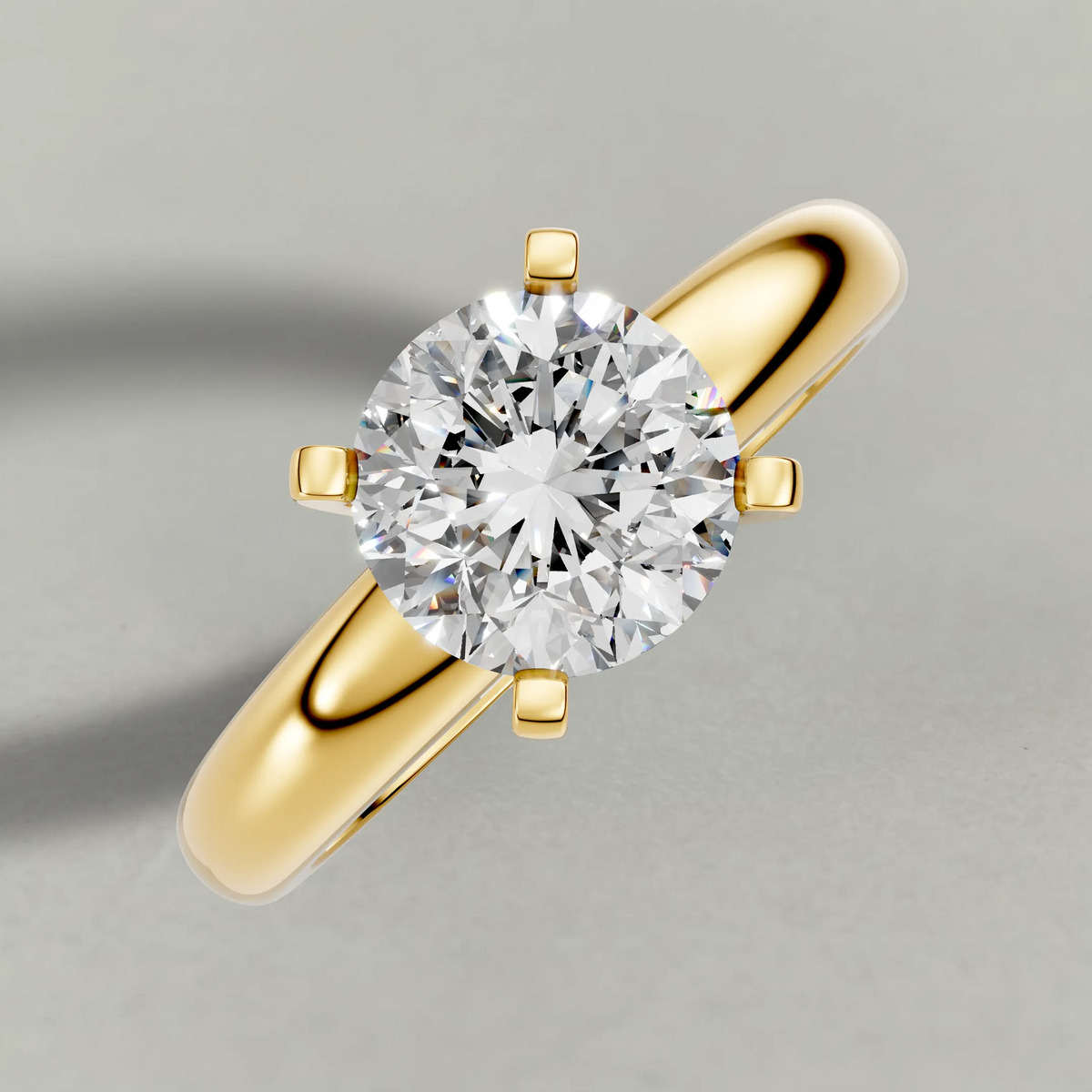 Wide Tapered Solitaire Engagement Ring (3808) in Yellow Gold from top 3/4 angle