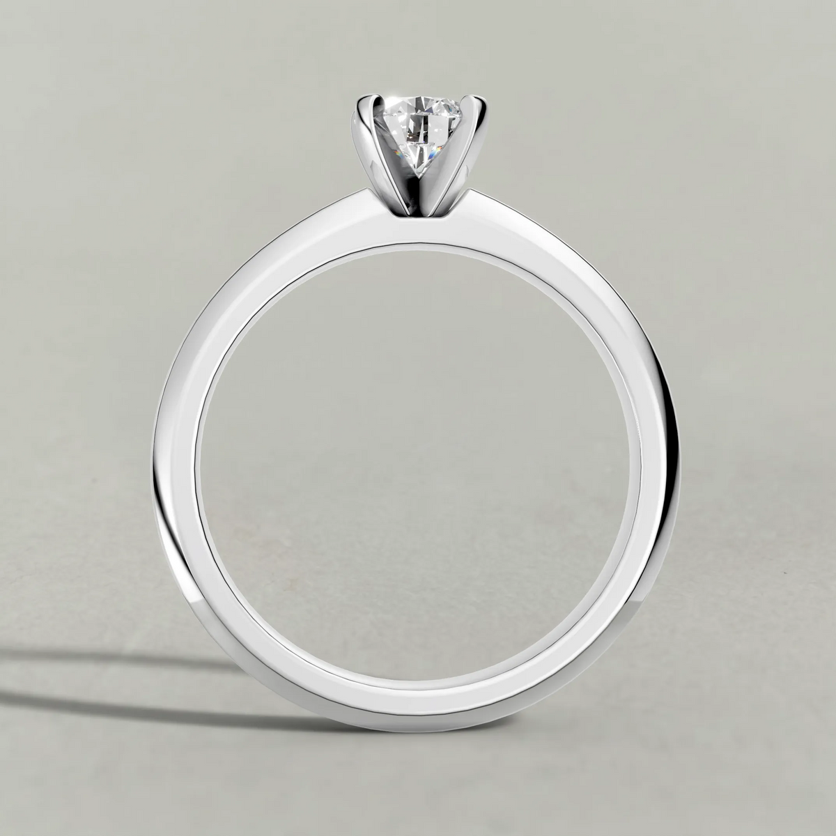 Slim Tapered Solitaire Engagement Ring (3840) in Platinum from front angle