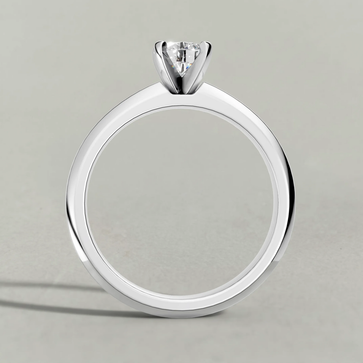 Slim Tapered Solitaire Engagement Ring (3840) in White Gold from front angle