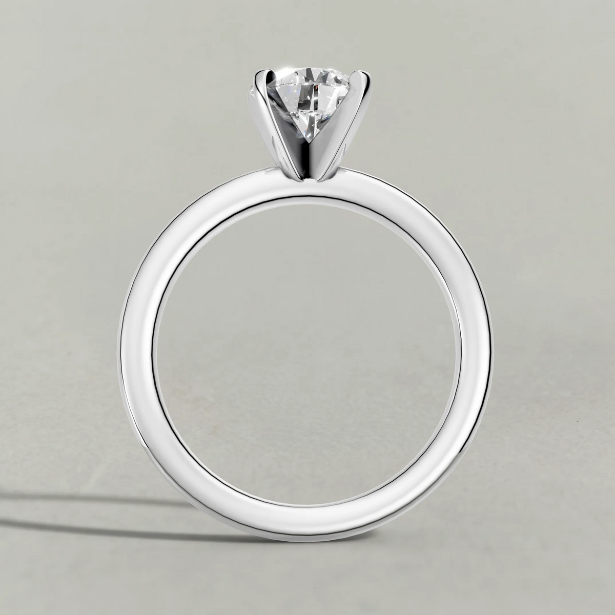 Petite Basket Solitaire Engagement Ring (3905) in Platinum from front angle