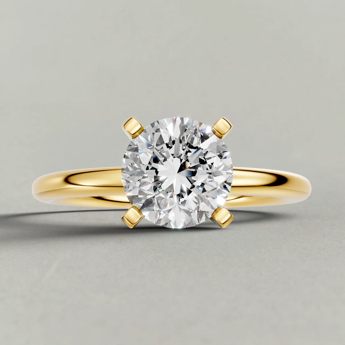 Petite Basket Solitaire Engagement Ring (3905) in Yellow Gold zoomed in on diamond