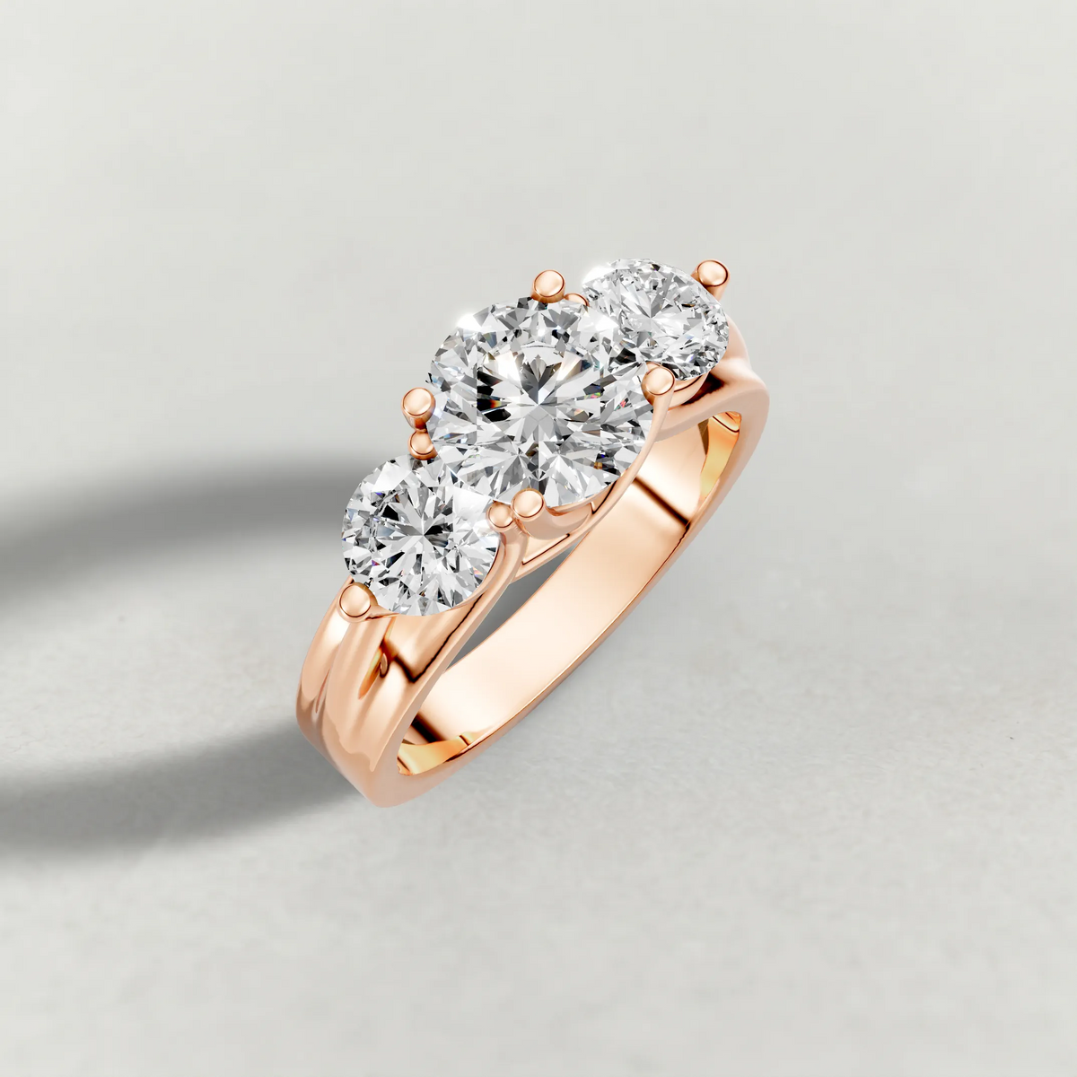 Sculpted Three-Stone Diamond Engagement Ring (3988) in Rose Gold from top 3/4 angle