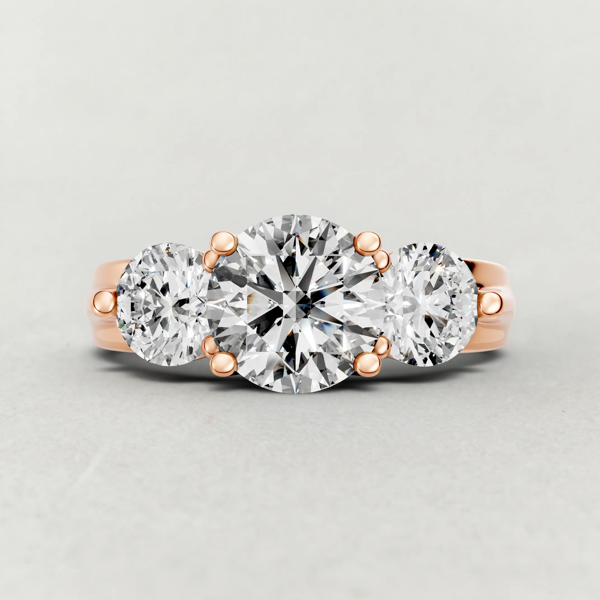 Sculpted Three-Stone Diamond Engagement Ring (3988) in Rose Gold zoomed in on diamond