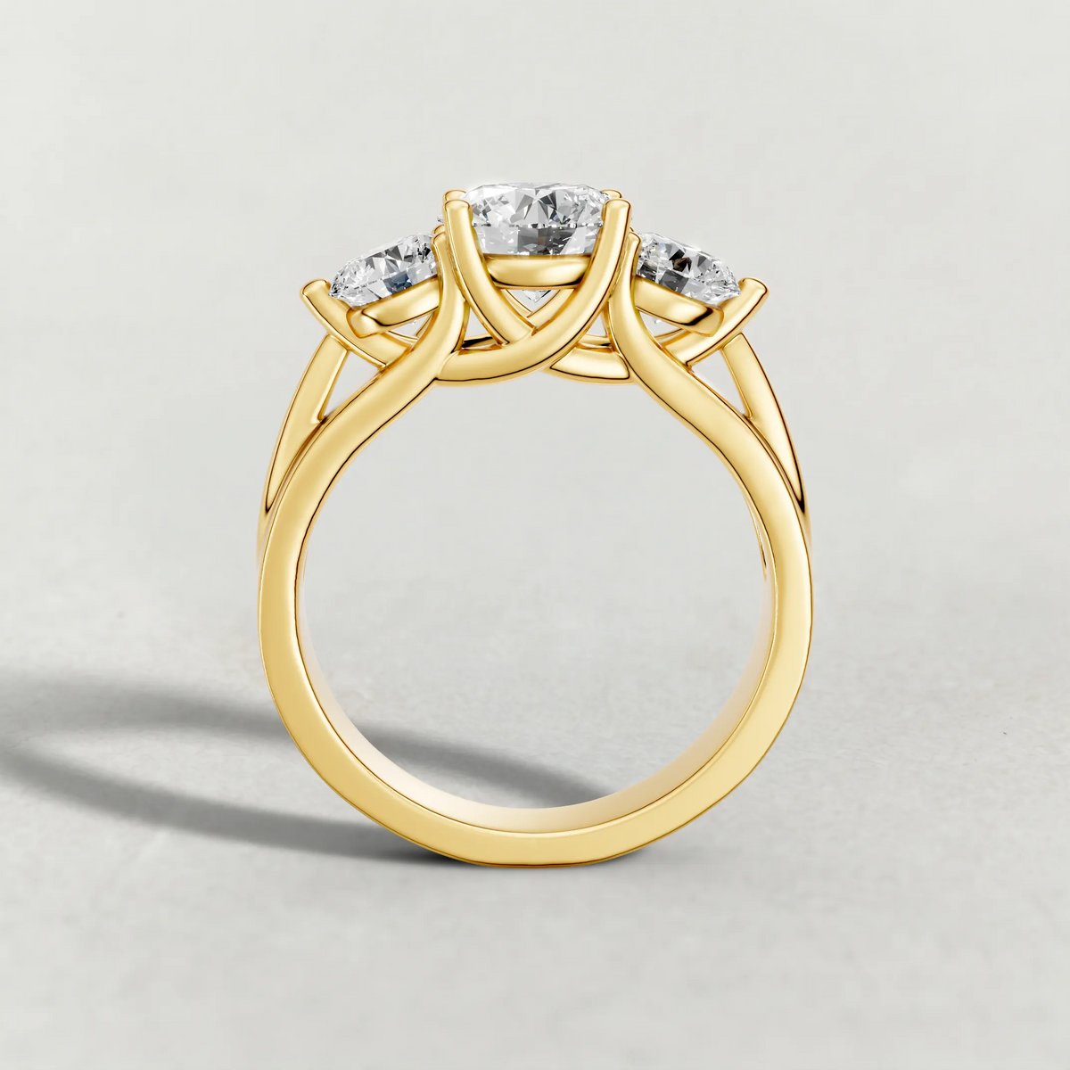 Sculpted Three-Stone Diamond Engagement Ring (3988) in Yellow Gold from front angle
