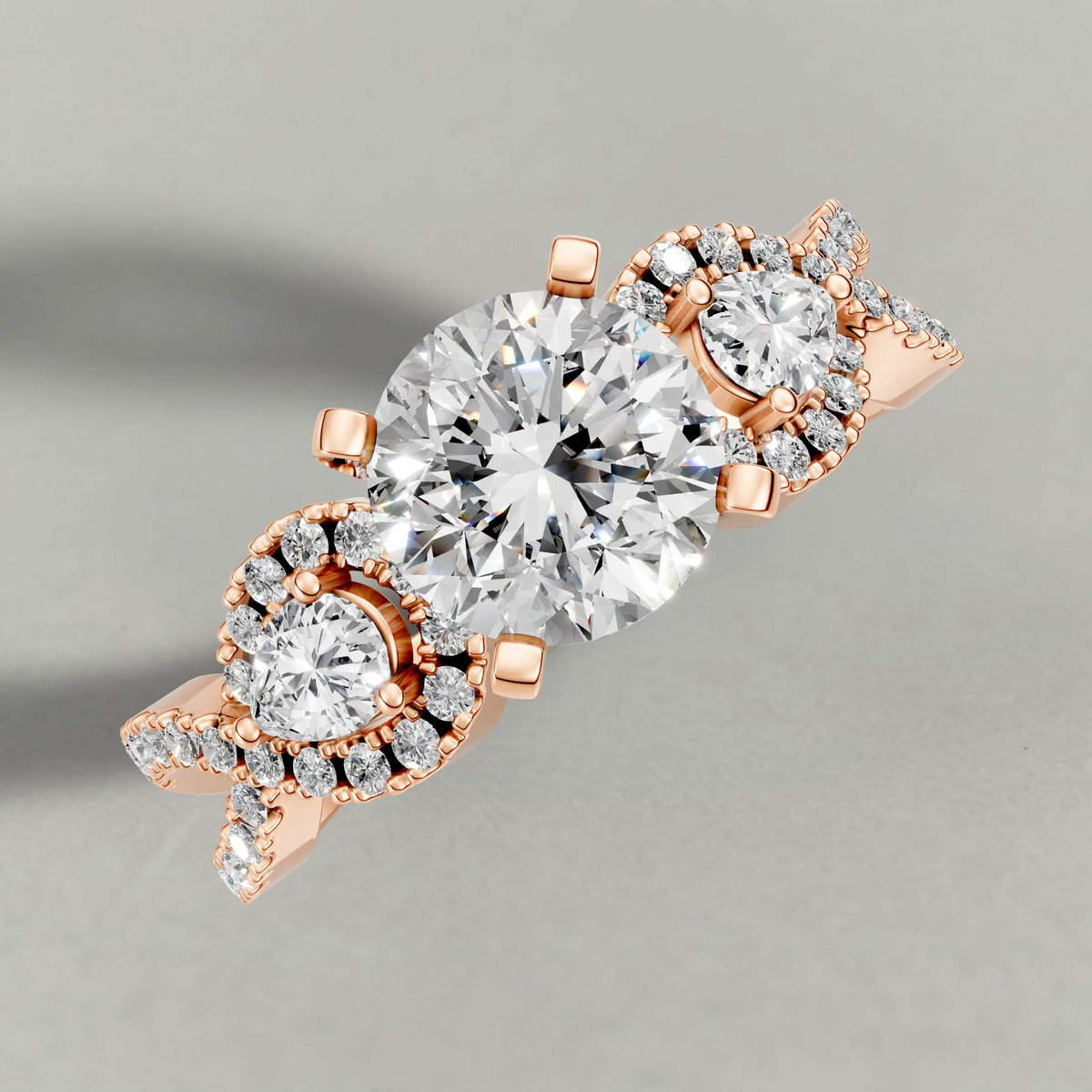 Three-Stone Pavé Twist Engagement Ring (70667) in Rose Gold from top 3/4 angle