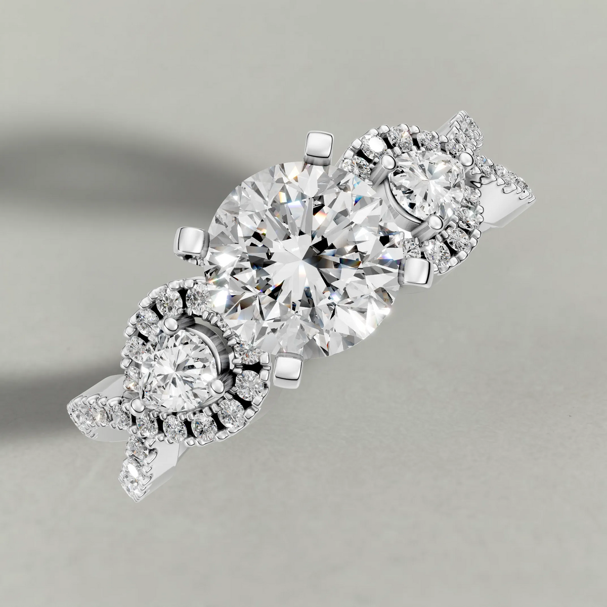 Three-Stone Pavé Twist Engagement Ring (70667) in White Gold from top 3/4 angle