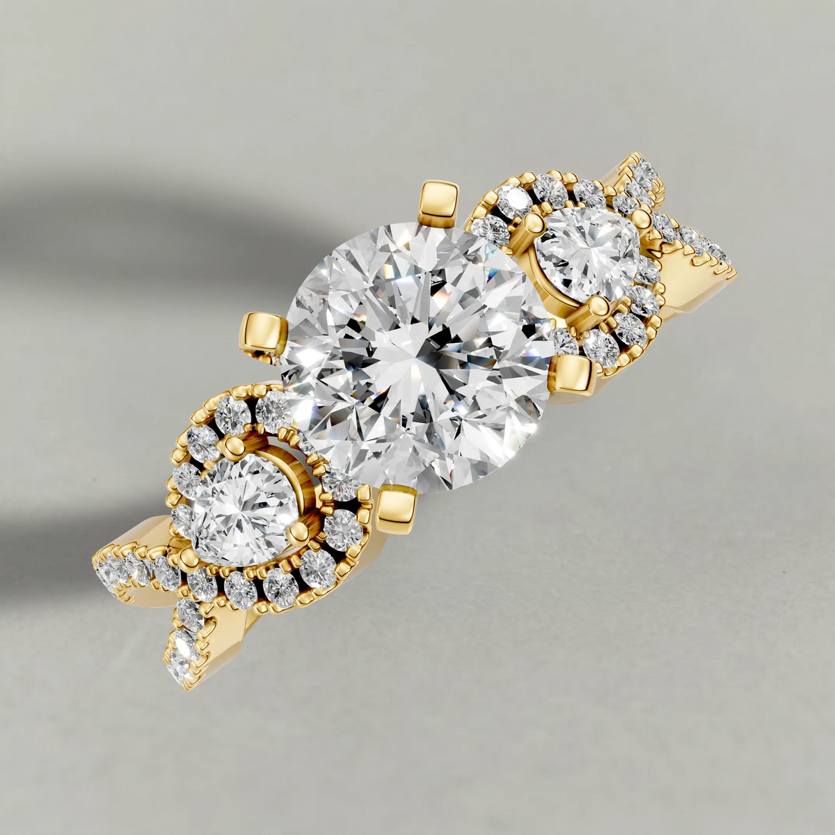 Three-Stone Pavé Twist Engagement Ring (70667) in Yellow Gold from top 3/4 angle
