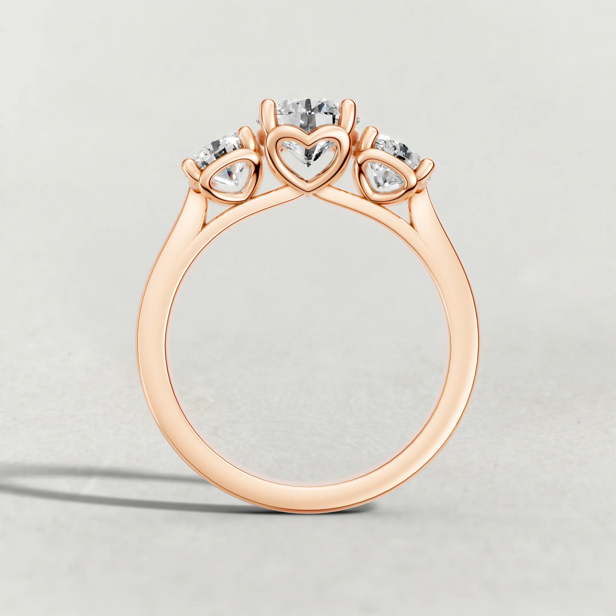 Three-Stone Side Diamond Engagement Ring (70673) in Rose Gold from front angle
