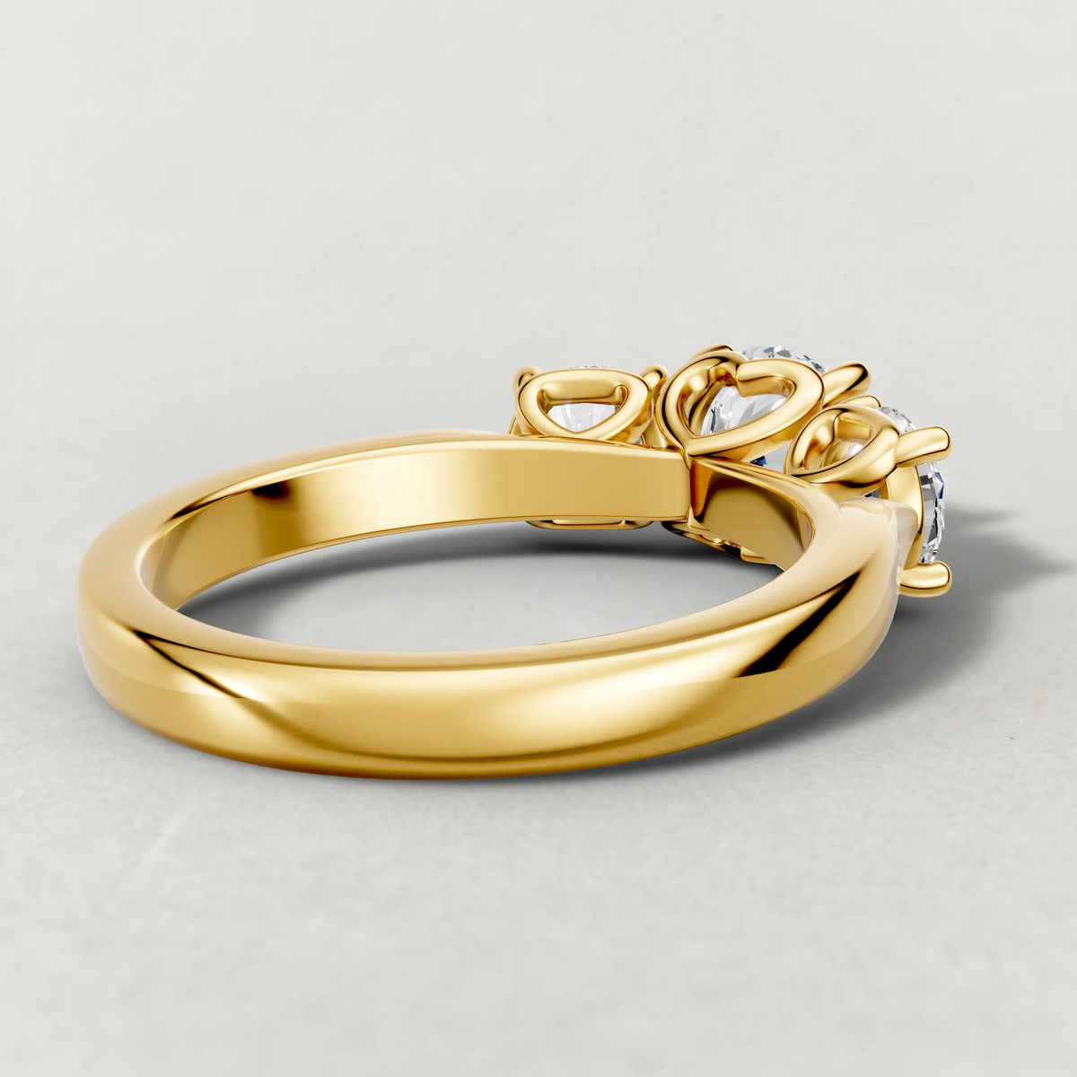 Three-Stone Side Diamond Engagement Ring (70673) in Yellow Gold from back angle