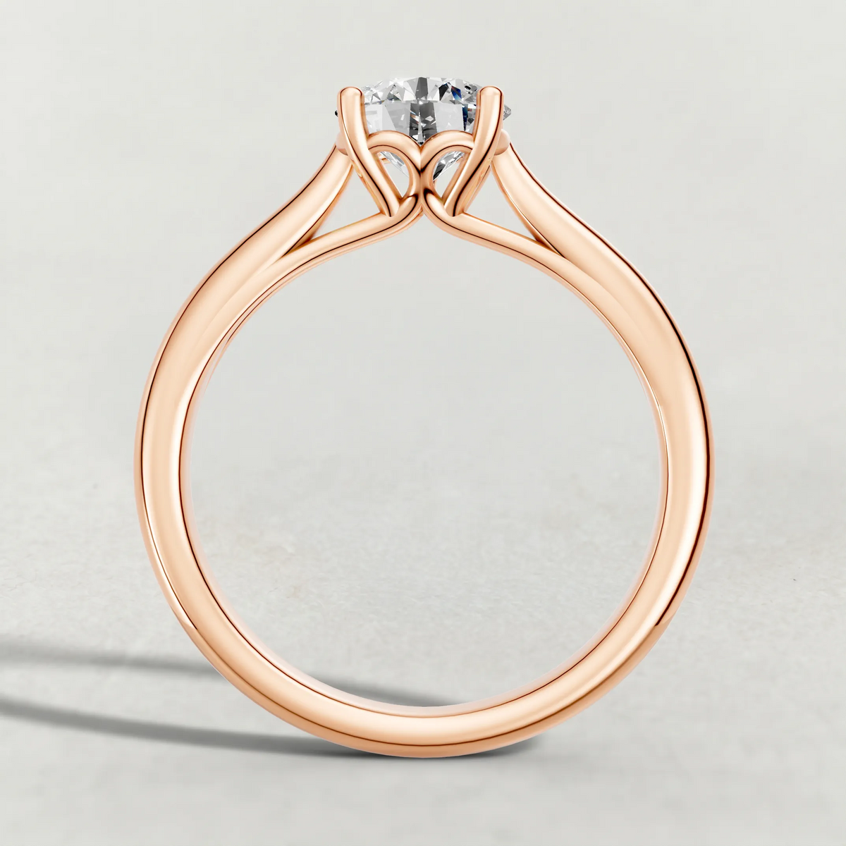 Tapered Four-Prong Solitaire Engagement Ring (70686) in Rose Gold from front angle