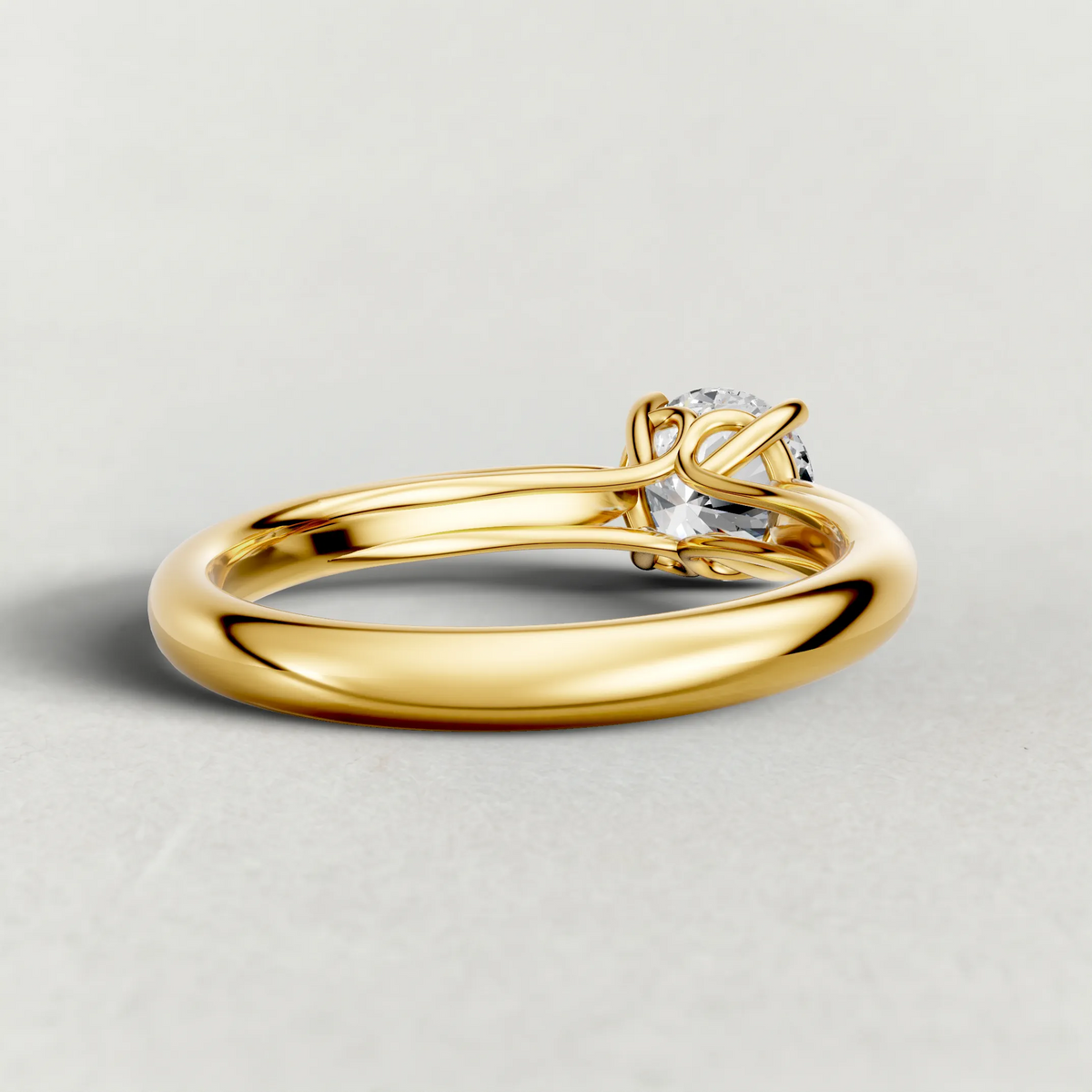Tapered Four-Prong Solitaire Engagement Ring (70686) in Yellow Gold from back angle