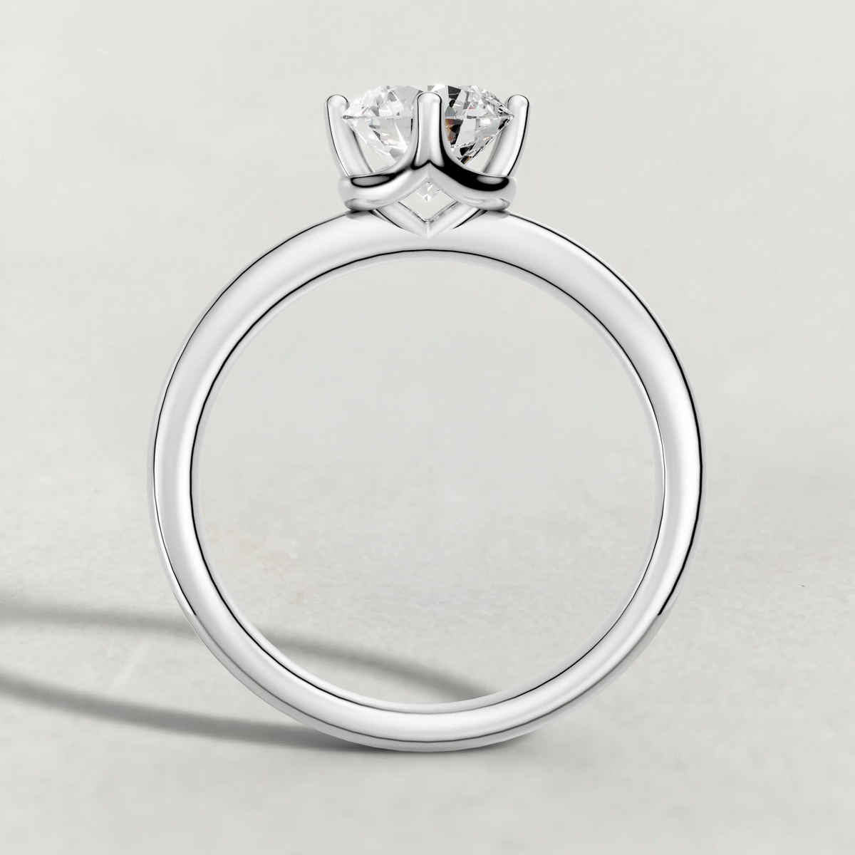 Compass-Set Solitaire Engagement Ring (70690) in White Gold from front angle