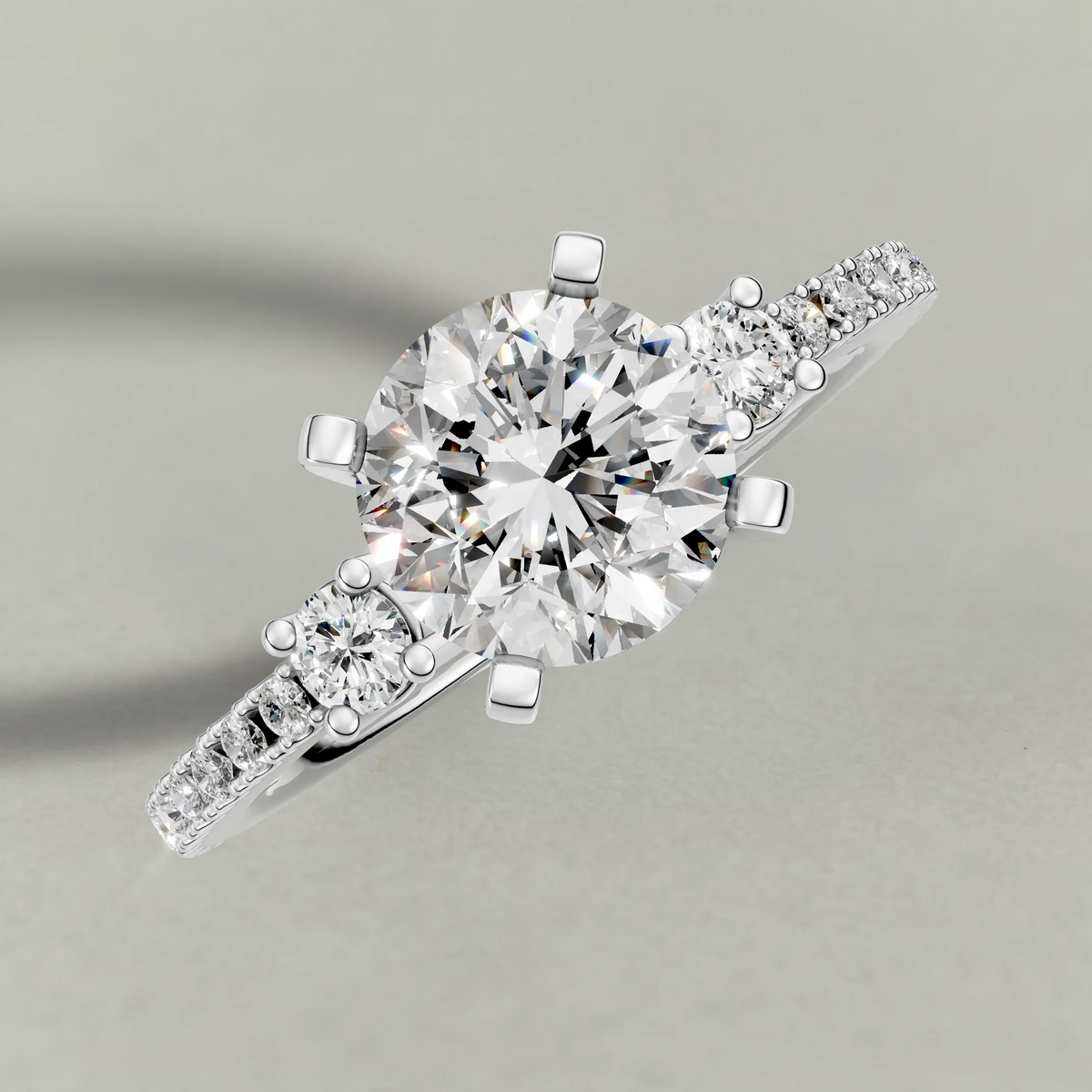 Three-Stone Pavé Engagement Ring (70857) in White Gold from top 3/4 angle