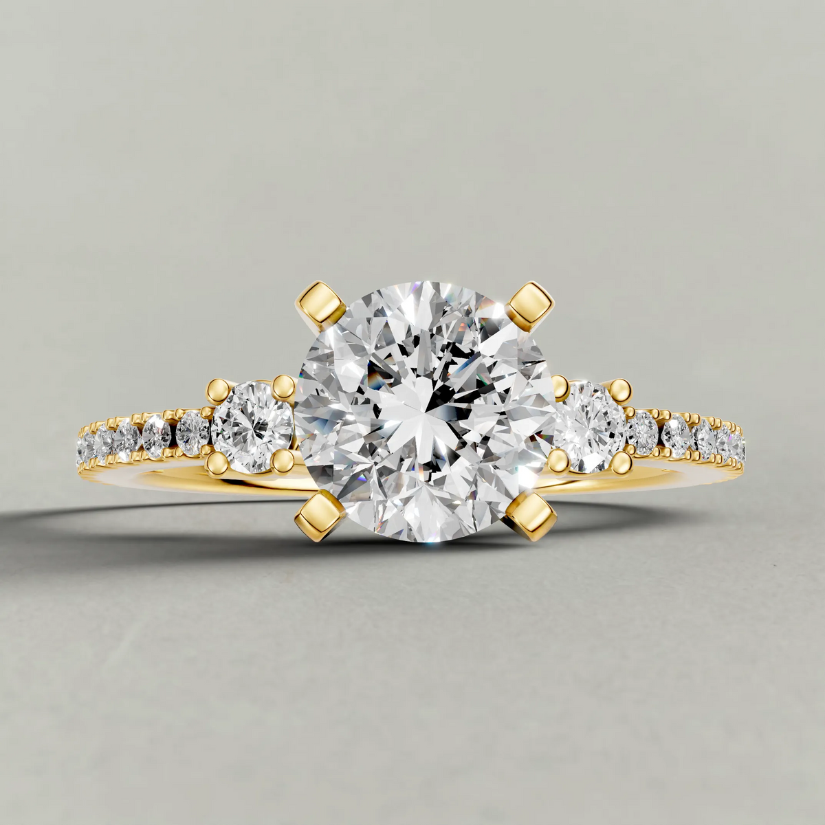 Three-Stone Pavé Engagement Ring (70857) in Yellow Gold zoomed in on diamond