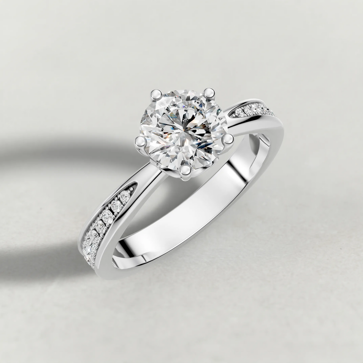 Delicate Pavé Shoulder Solitaire Engagement Ring (70887) in Platinum from top 3/4 angle