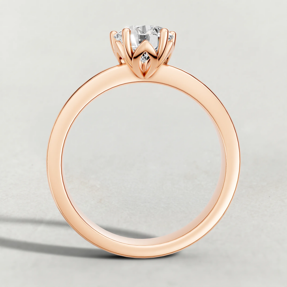 Delicate Pavé Shoulder Solitaire Engagement Ring (70887) in Rose Gold from front angle