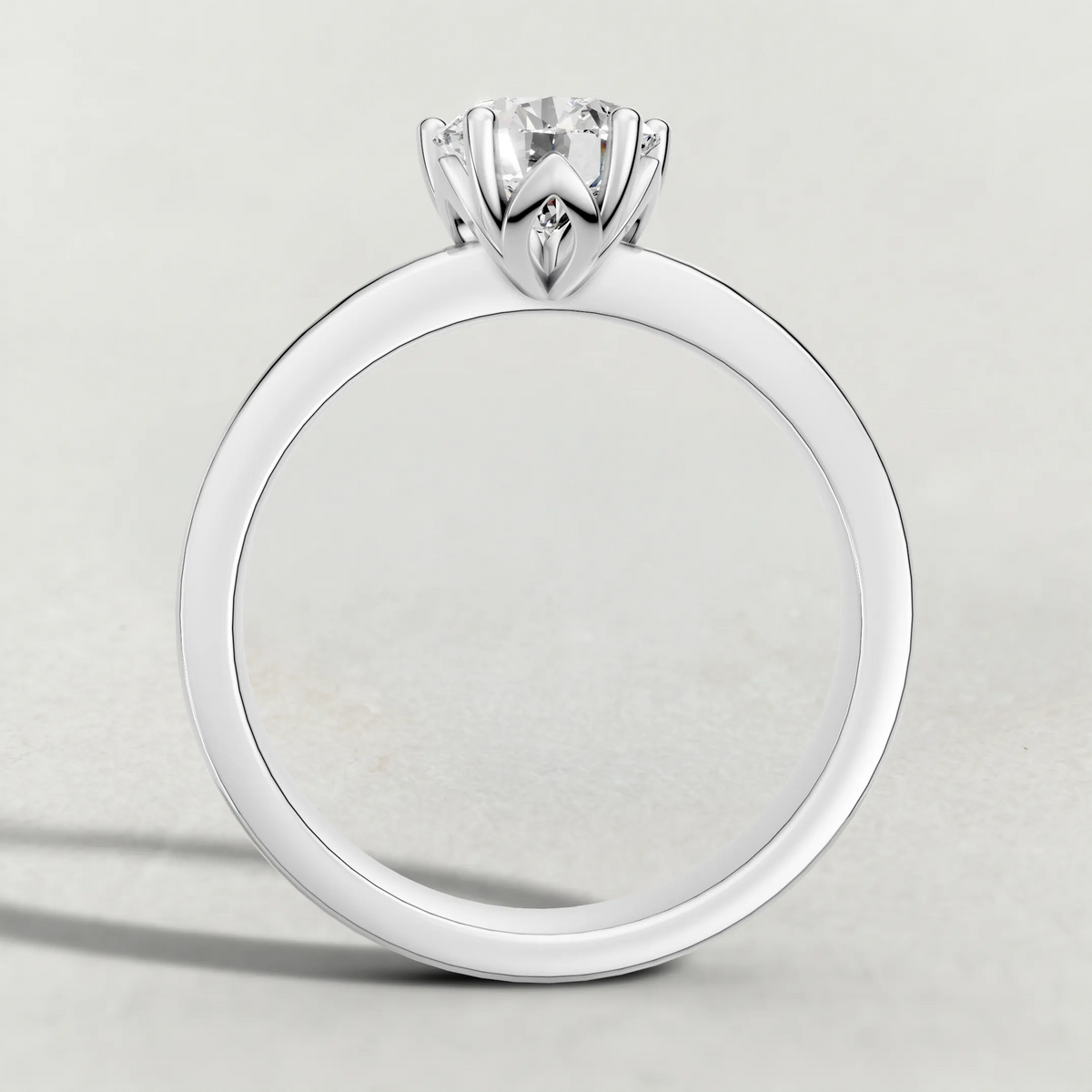 Delicate Pavé Shoulder Solitaire Engagement Ring (70887) in White Gold from front angle
