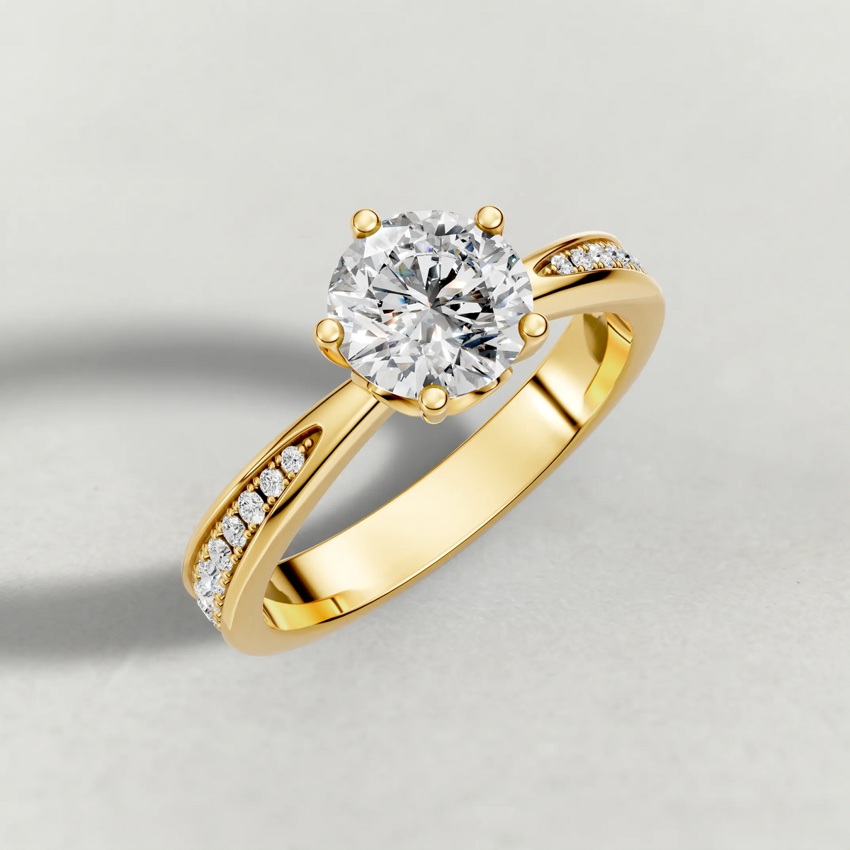 Delicate Pavé Shoulder Solitaire Engagement Ring (70887) in Yellow Gold from top 3/4 angle