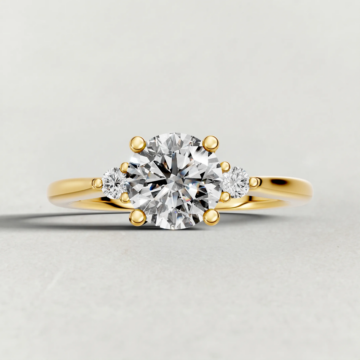 Diamond Accent Shoulder Solitaire Engagement Ring (70934) in Yellow Gold zoomed in on diamond
