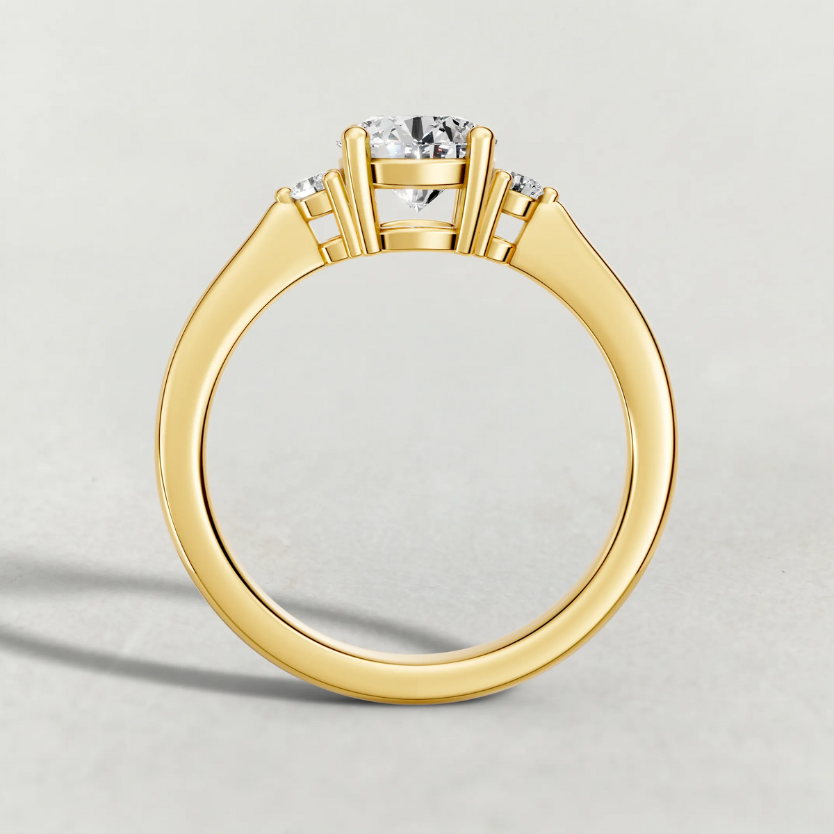 Diamond Accent Shoulder Solitaire Engagement Ring (70934) in Yellow Gold from front angle