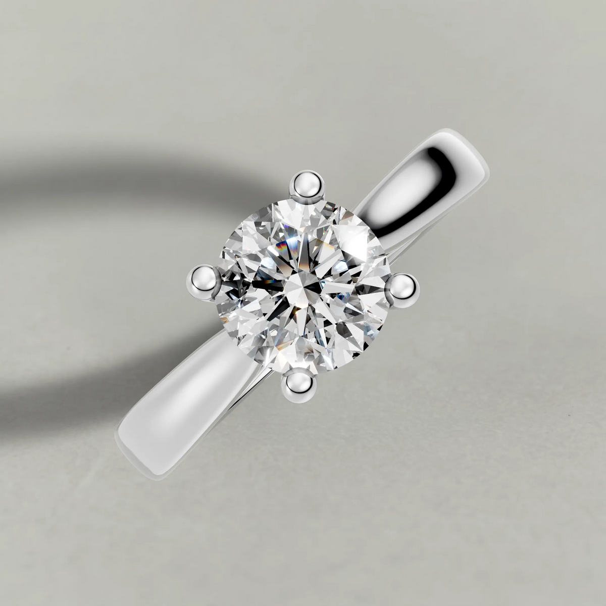 Forked Shoulder Solitaire Engagement Ring (70980) in Platinum from top 3/4 angle