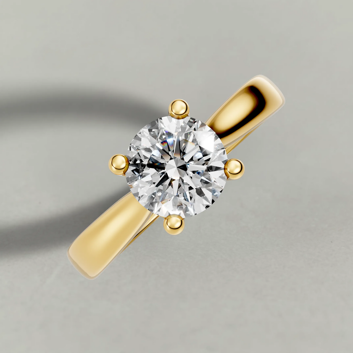 Forked Shoulder Solitaire Engagement Ring (70980) in Yellow Gold from top 3/4 angle