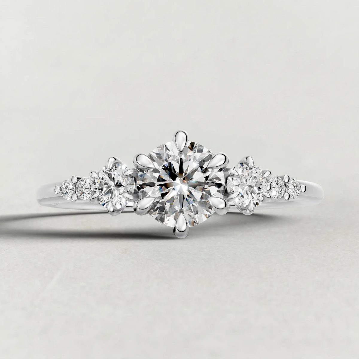 Graduated Side-Stone Engagement Ring (72084) in Platinum zoomed in on diamond