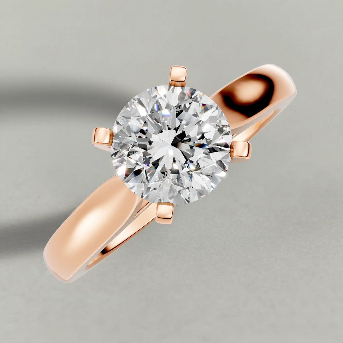 Tapered Cathedral Solitaire Engagement Ring (7587) in Rose Gold from top 3/4 angle