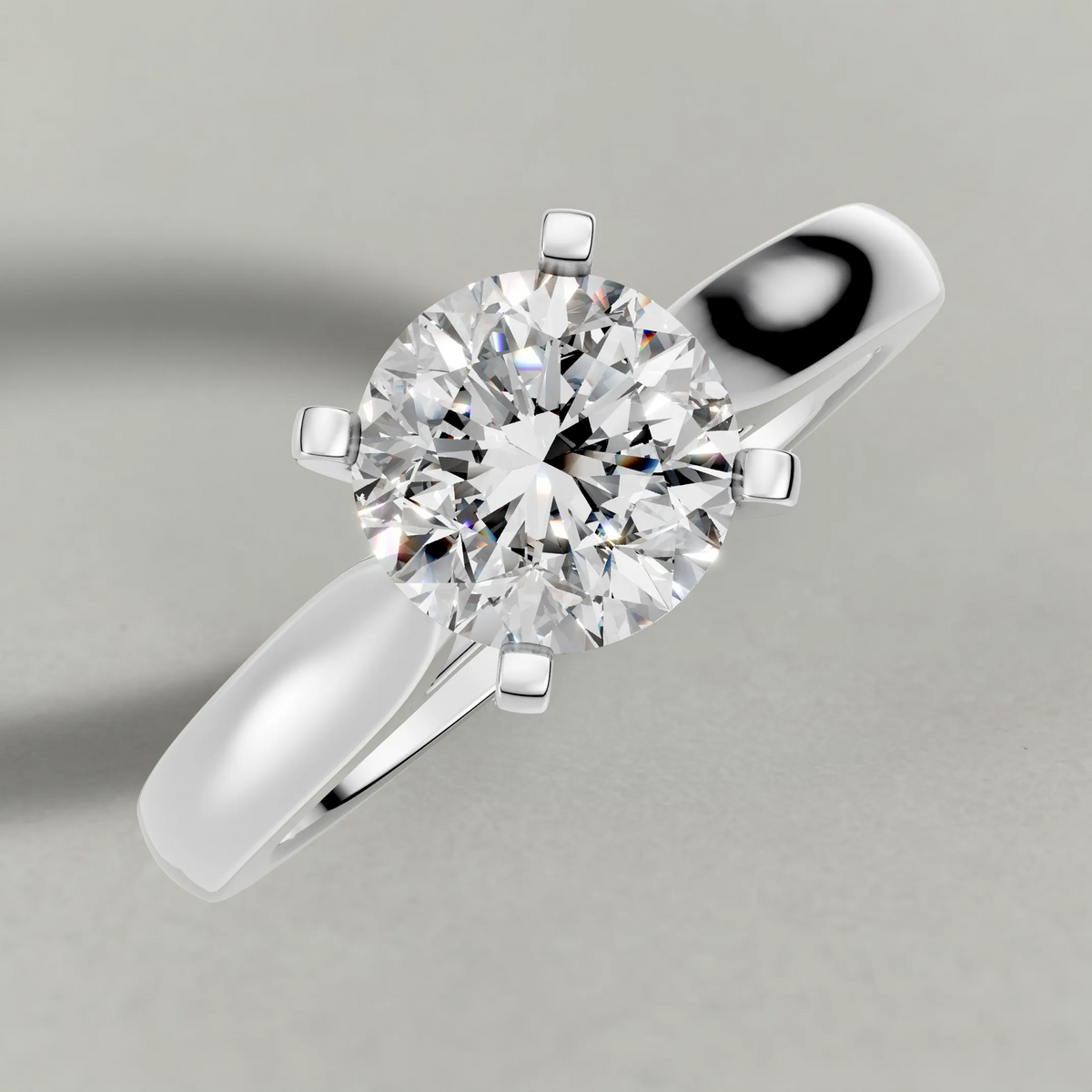 Tapered Cathedral Solitaire Engagement Ring (7587) in White Gold from top 3/4 angle
