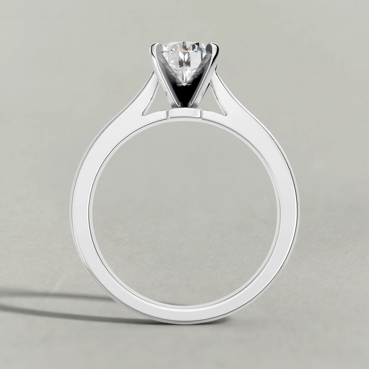 Tapered Cathedral Solitaire Engagement Ring (7587) in White Gold from front angle