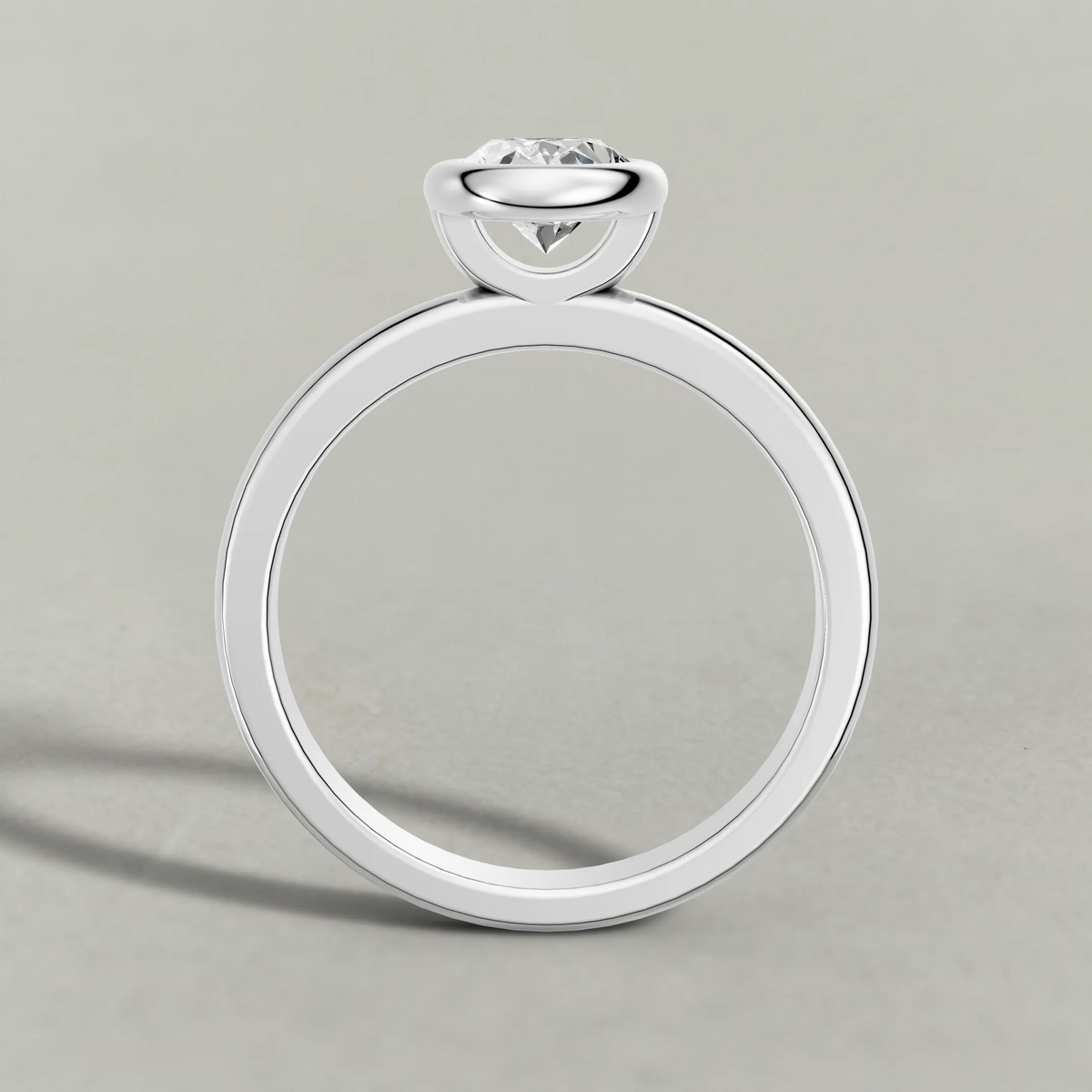 Smooth Bezel Engagement Ring (9379) in White Gold from front angle