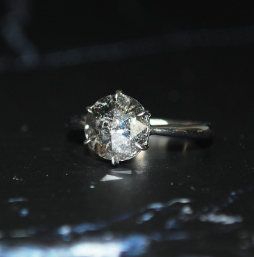 Diamond ring on reflective surface