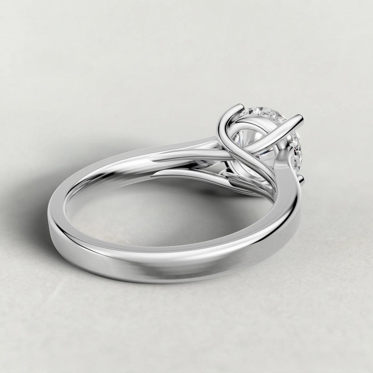 Swept Shoulder Solitaire Engagement Ring (0644) in Platinum from back angle
