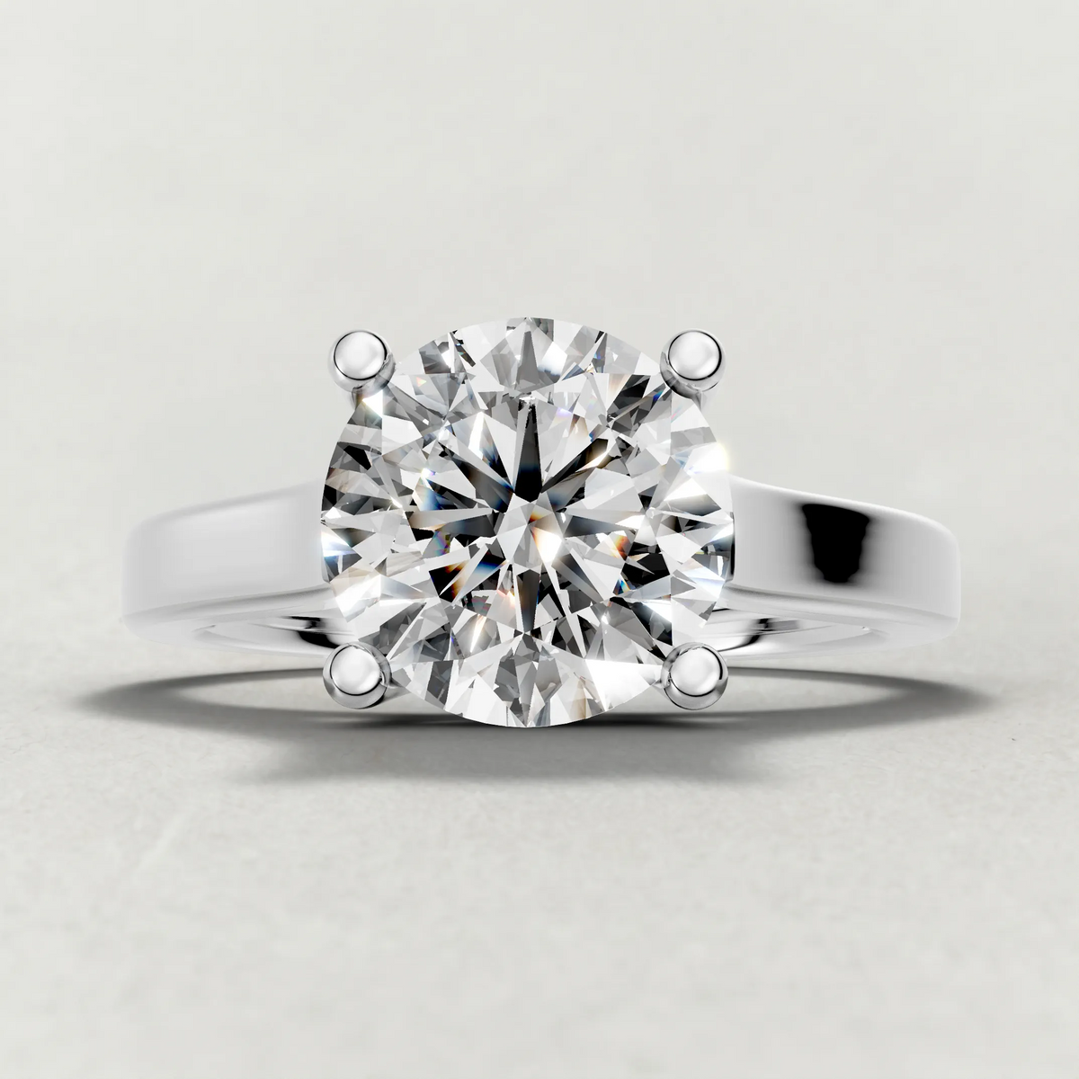 Swept Shoulder Solitaire Engagement Ring (0644) in White Gold zoomed in on diamond