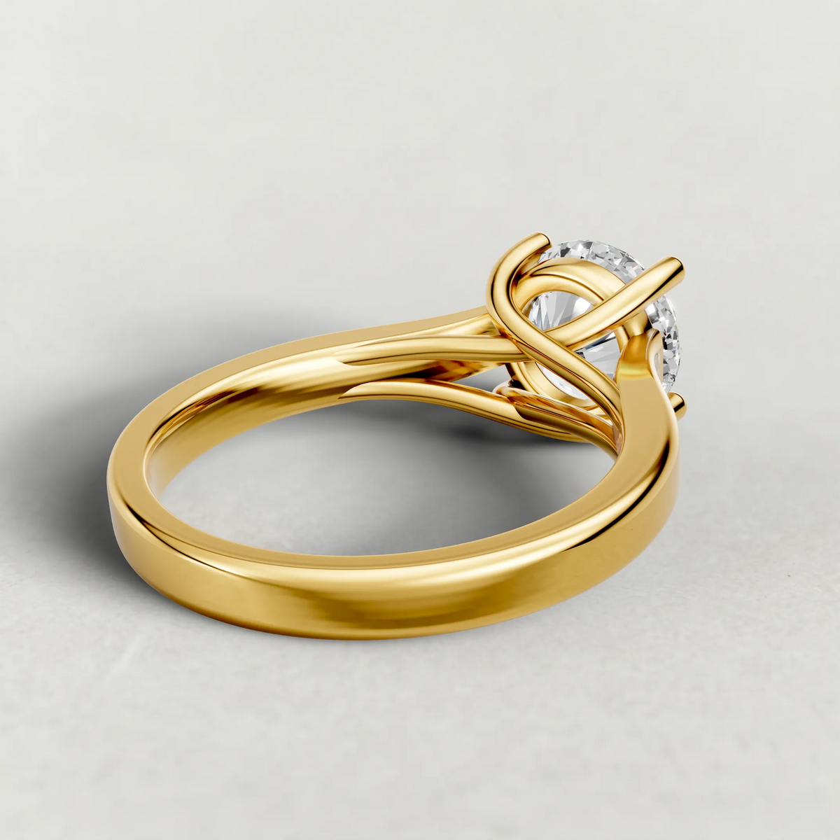 Swept Shoulder Solitaire Engagement Ring (0644) in Yellow Gold from back angle
