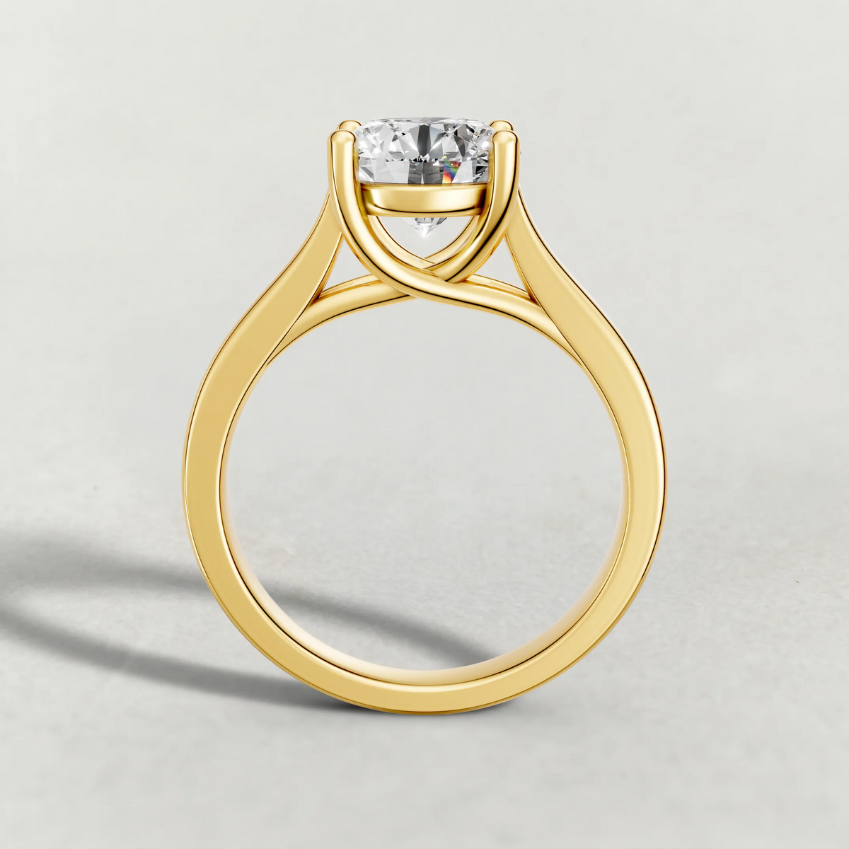 Swept Shoulder Solitaire Engagement Ring (0644) in Yellow Gold from front angle
