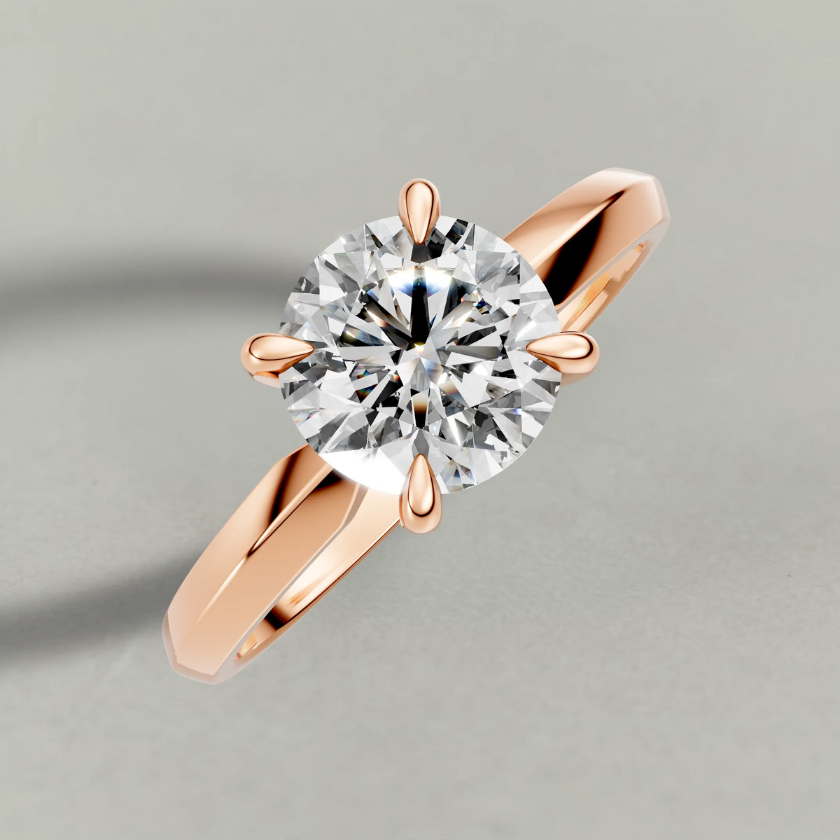 Knife-Edge Solitaire Engagement Ring (1113) in Rose Gold from top 3/4 angle
