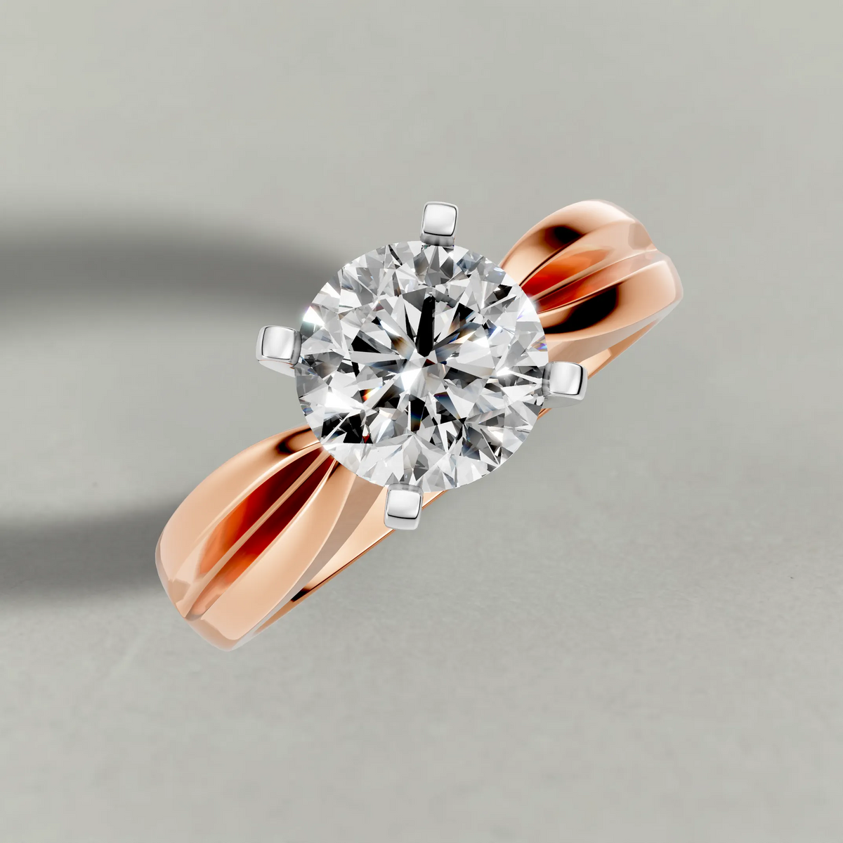 Sculpted Split-Shank Solitaire Engagement Ring (1596) in Rose Gold from top 3/4 angle