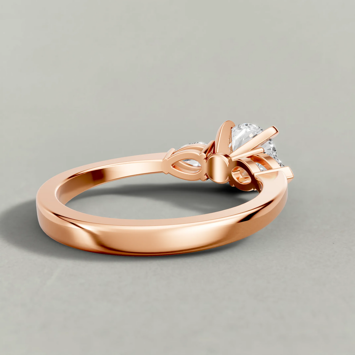Three-Stone Side-Stone Engagement Ring (2046) in Rose Gold from back angle