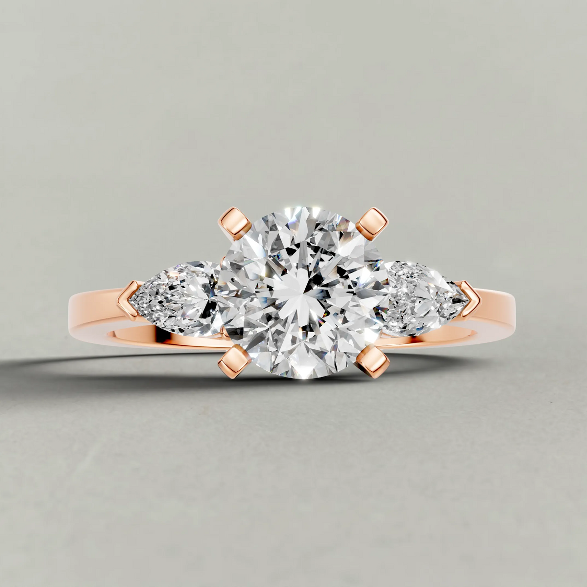 Three-Stone Side-Stone Engagement Ring (2046) in Rose Gold zoomed in on diamond
