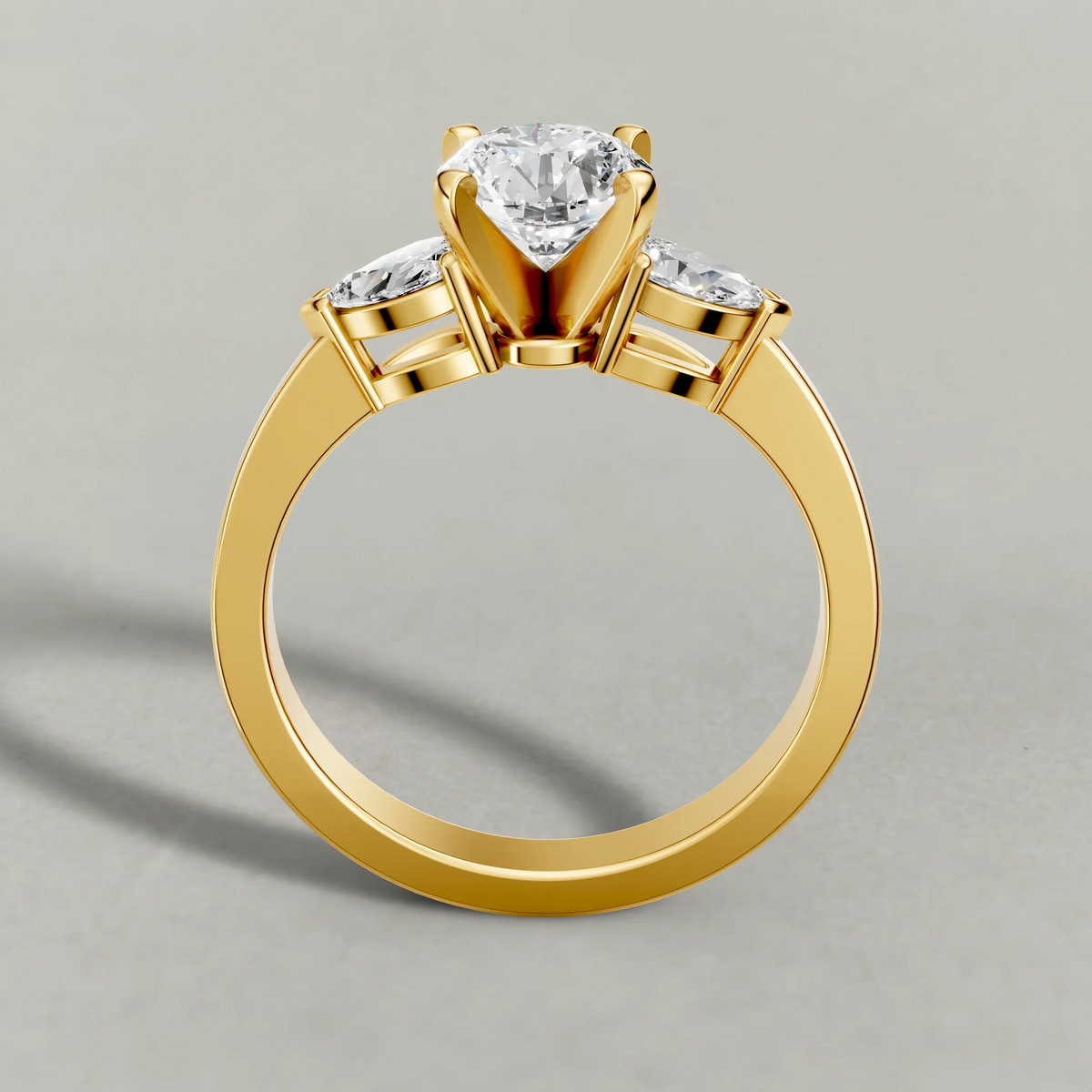 Three-Stone Side-Stone Engagement Ring (2046) in Yellow Gold from front angle