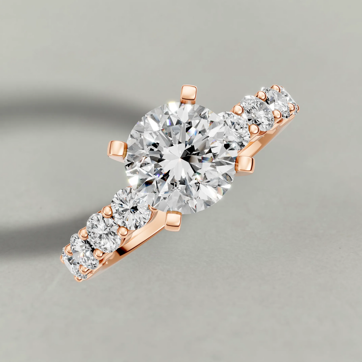 Shared-Prong Diamond Shoulder Multi-Stone Engagement Ring (2112) in Rose Gold from top 3/4 angle
