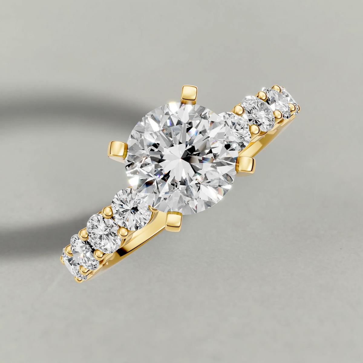 Shared-Prong Diamond Shoulder Multi-Stone Engagement Ring (2112) in Yellow Gold from top 3/4 angle