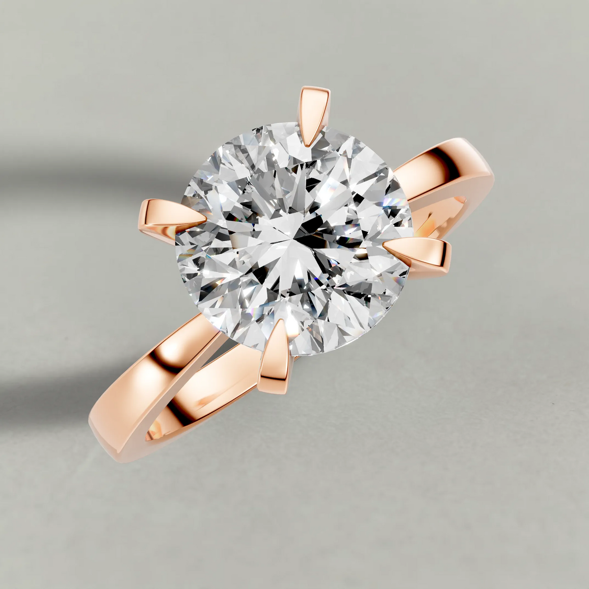 Soft-Taper Solitaire Engagement Ring (2512) in Rose Gold from top 3/4 angle
