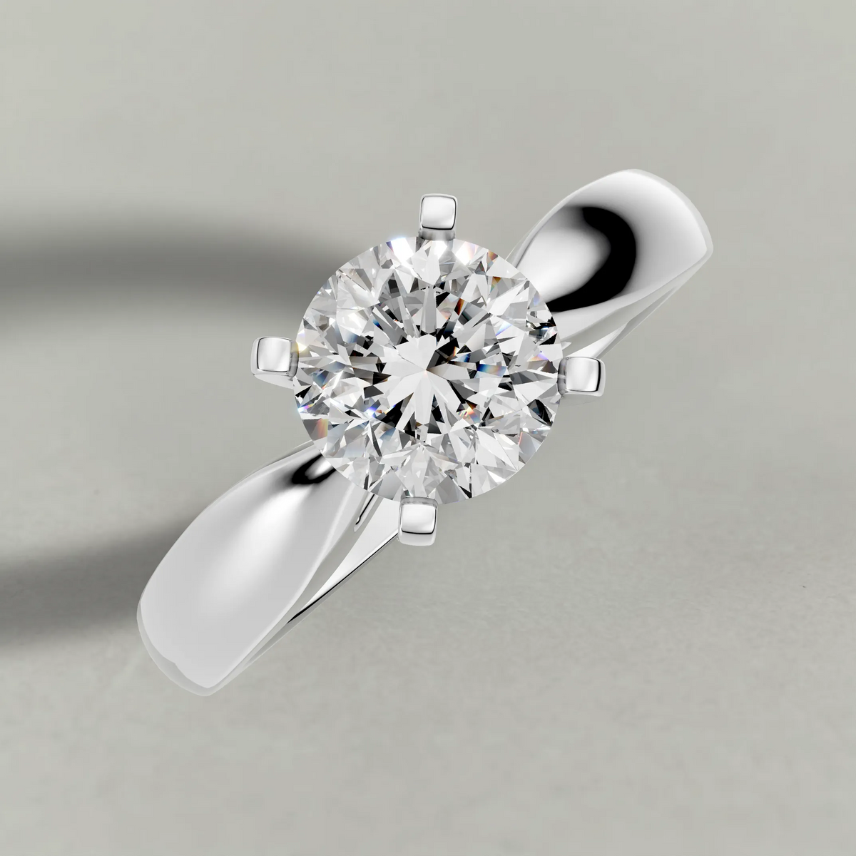 Sculpted Shoulder Solitaire Engagement Ring (2878) in White Gold from top 3/4 angle